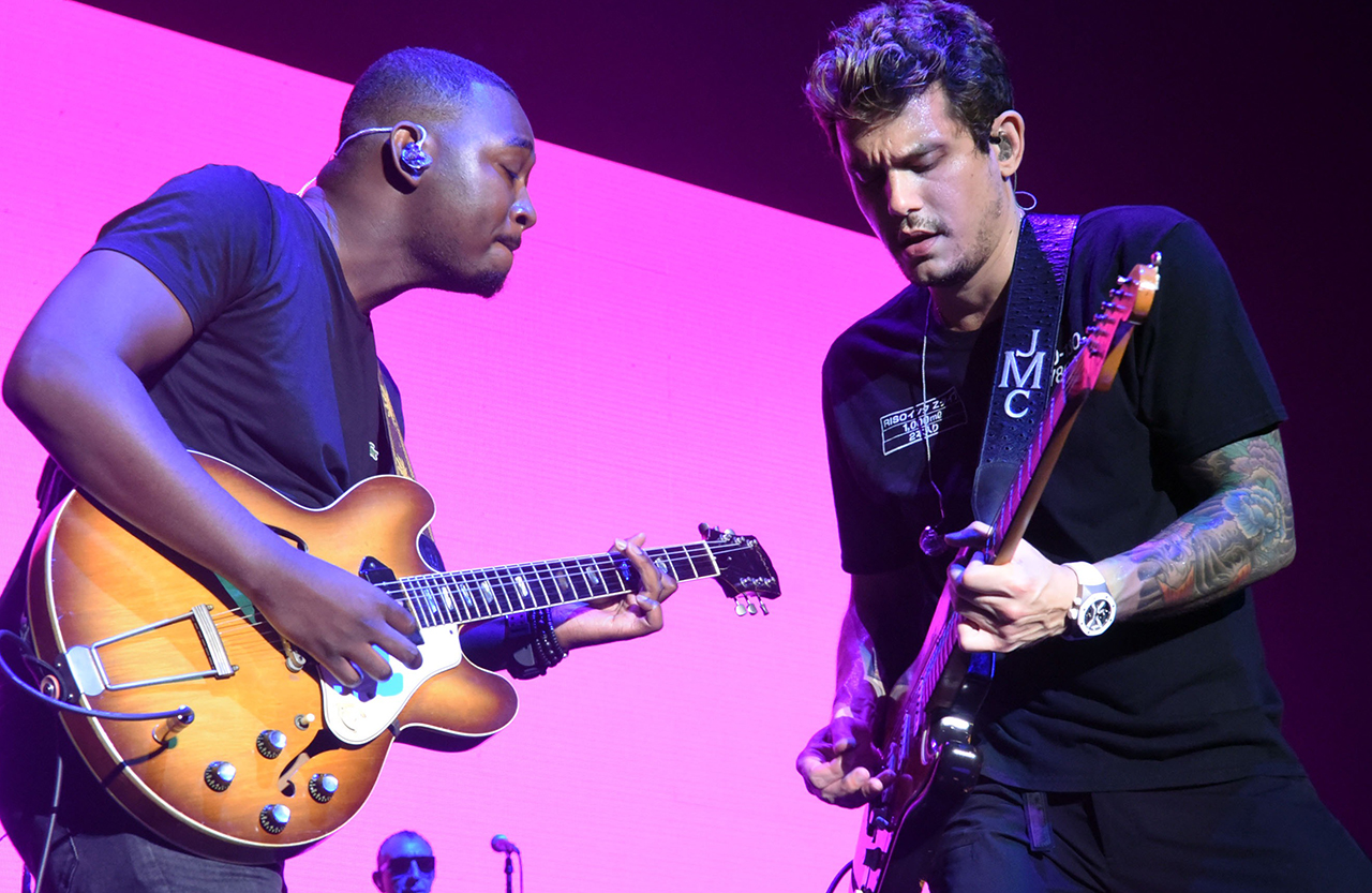 Isaiah Sharkey and John Mayer perform at Lakewood Amphitheatre on August 10, 2017 in Atlanta, Georgia.