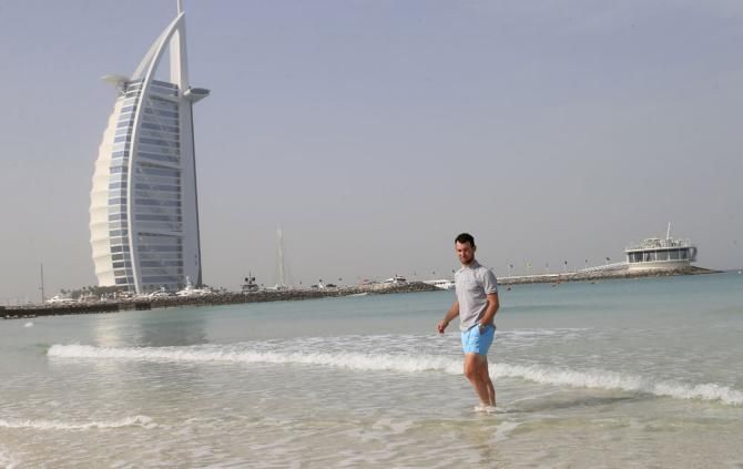 Mark Cavendish has a quick dip in the sea at Dubai
