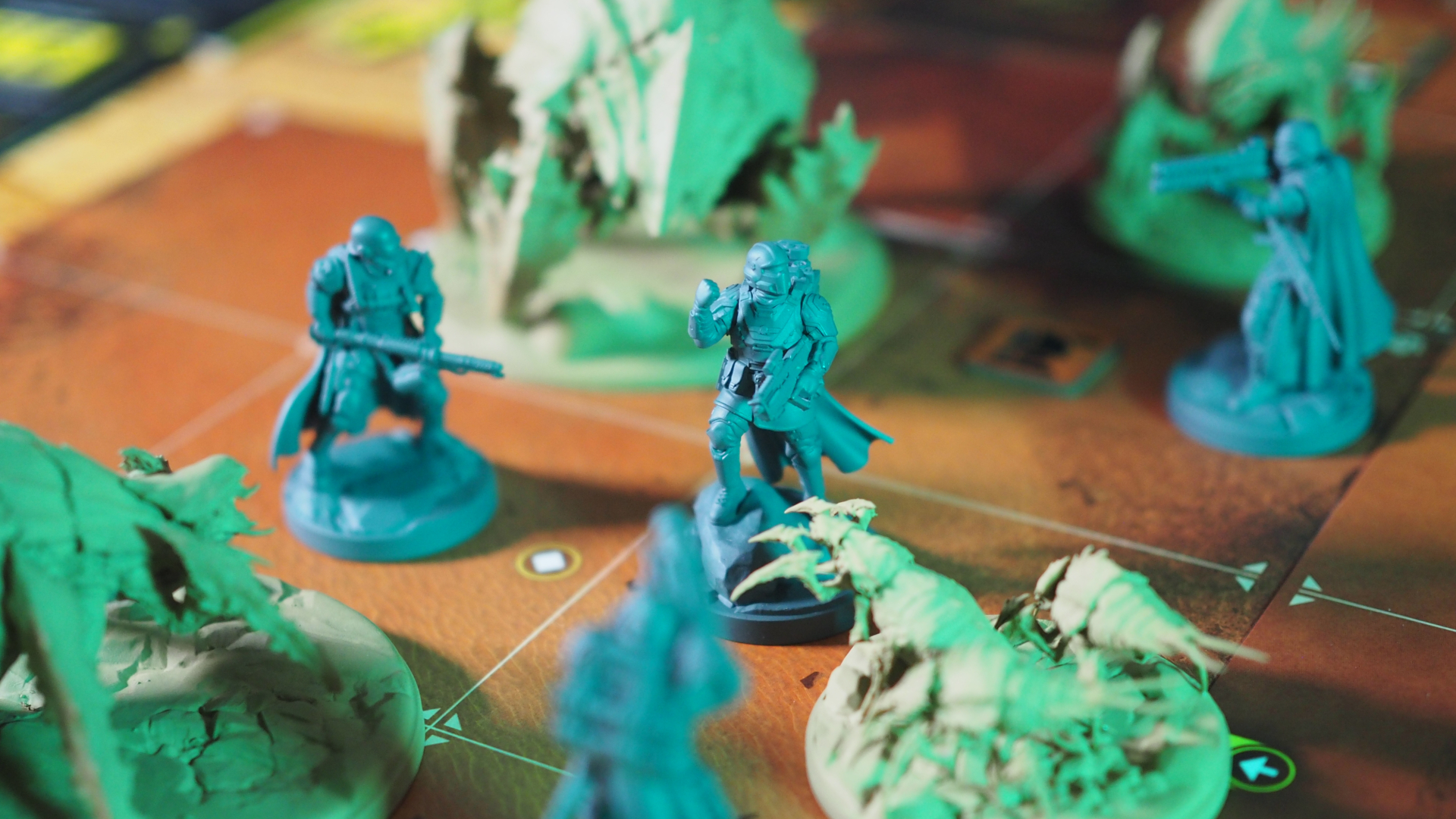 Helldivers 2 miniatures surrounded by Terminid models