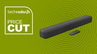 Amazon Fire TV Soundbar on green background with TechRadar price cut sign