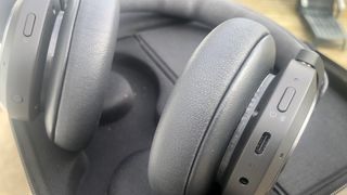 B&O Beoplay HX controls on earpieces