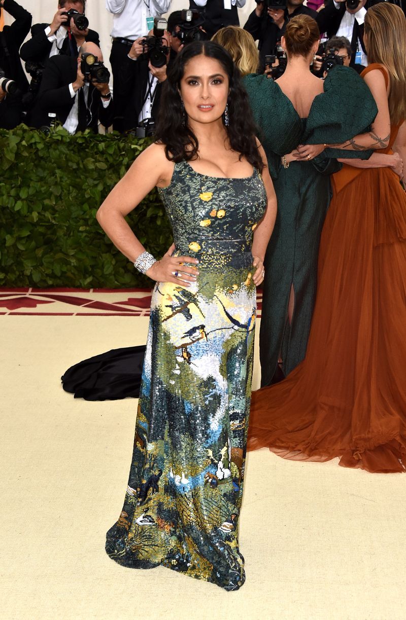 Clothing, Fashion model, Gown, Dress, Red carpet, Shoulder, Carpet, Fashion, Premiere, Flooring,