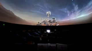 A view of a robot on the planetarium screen at the Griffith Observatory.