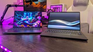 Image of the Lenovo Yoga Slim 9i 14 (Gen 10) and ASUS Zenbook A14 (2025) laptops.