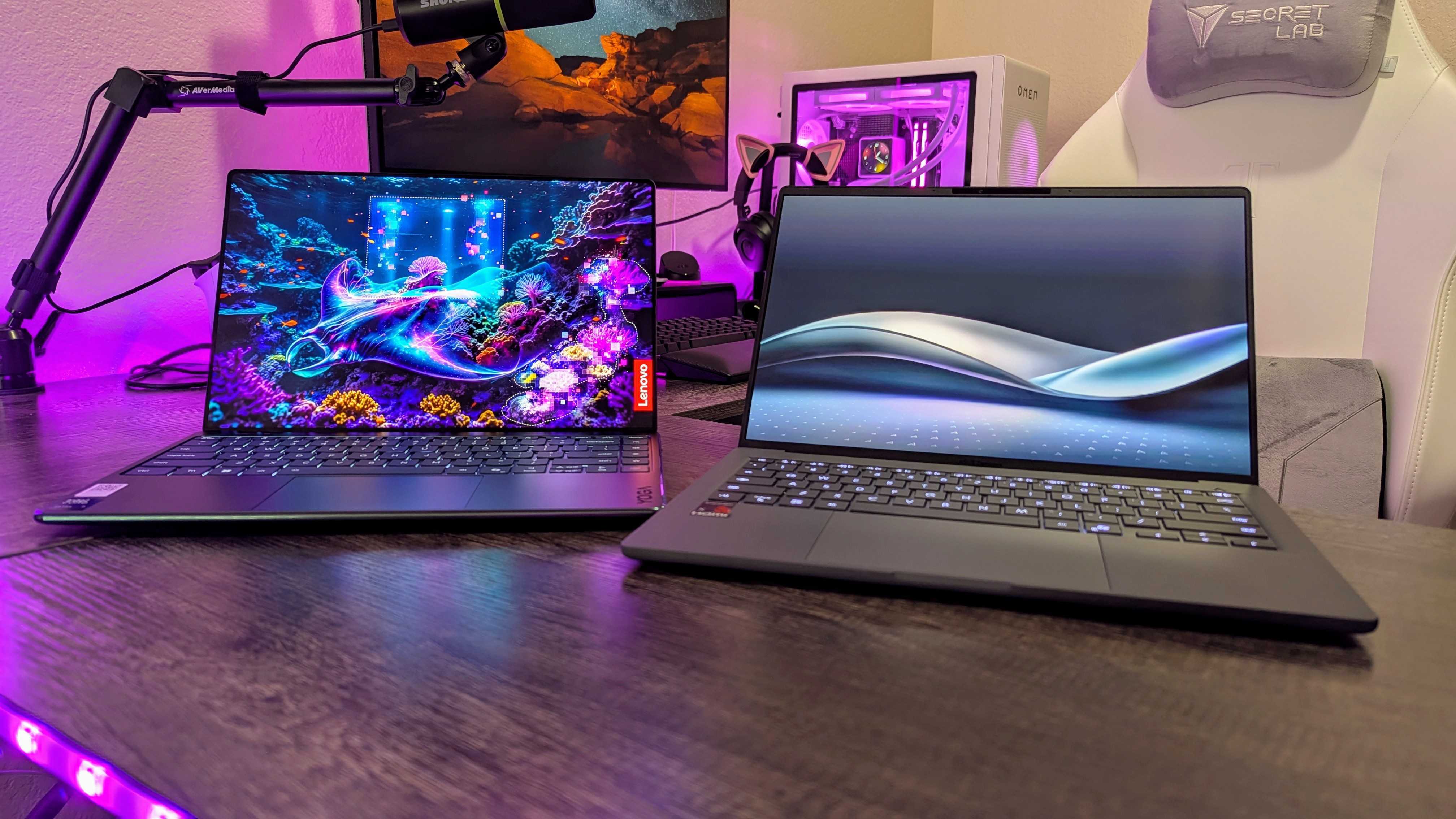 Image of the Lenovo Yoga Slim 9i 14 (Gen 10) and ASUS Zenbook A14 (2025) laptops.