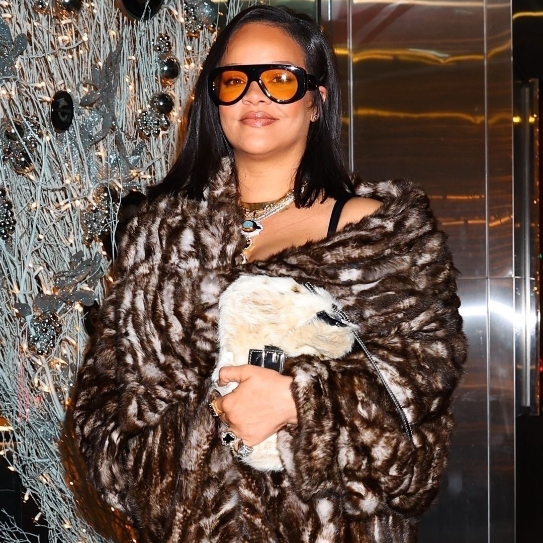 Rihanna was spotted in New York City wearing brown trousers, a fur coat, and a matching Fendi bag