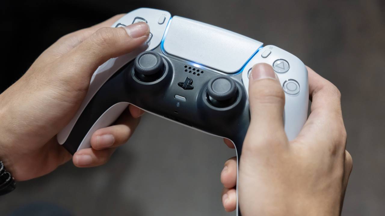 PS5 DualSense controller in hands