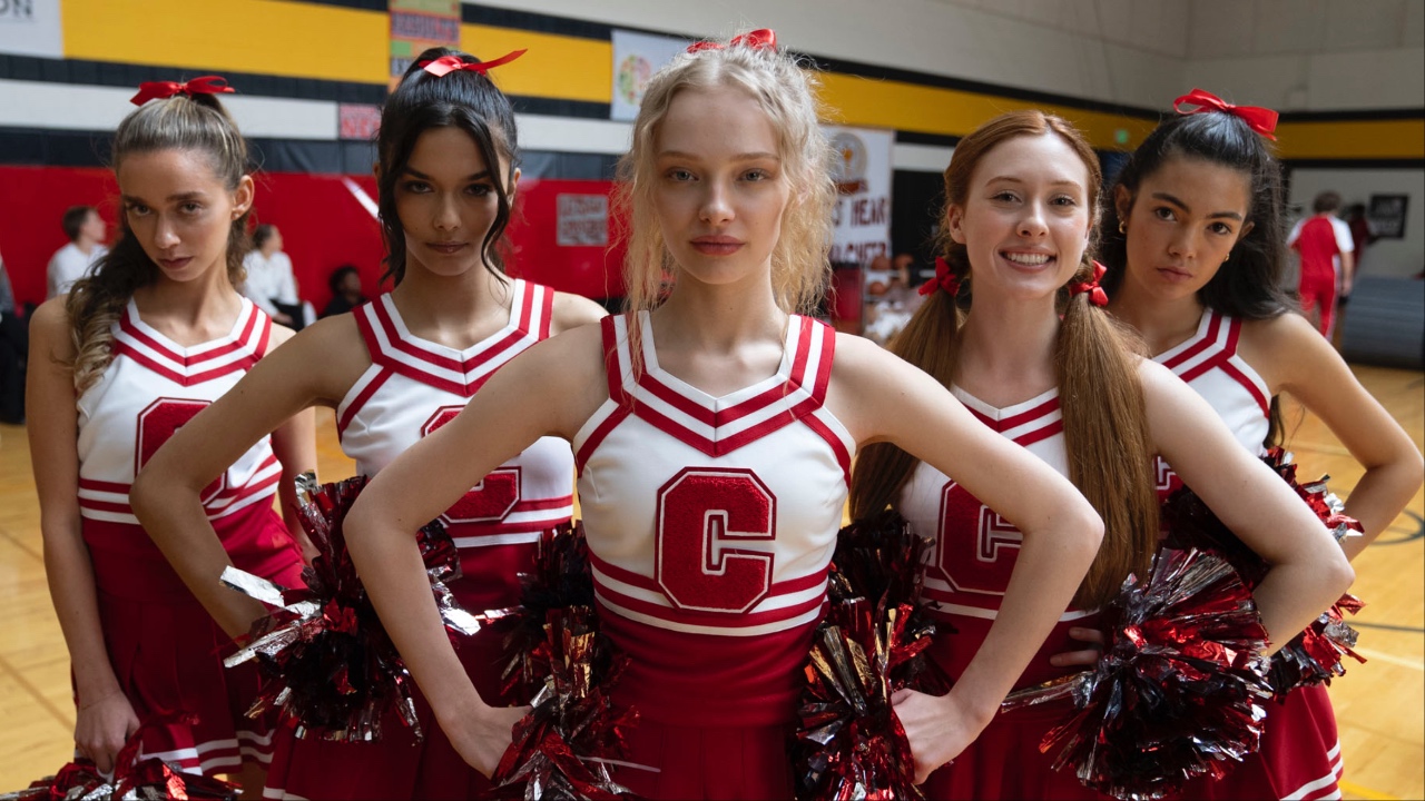 Katie and the rest of the cheerleaders in The Stranger in My Home