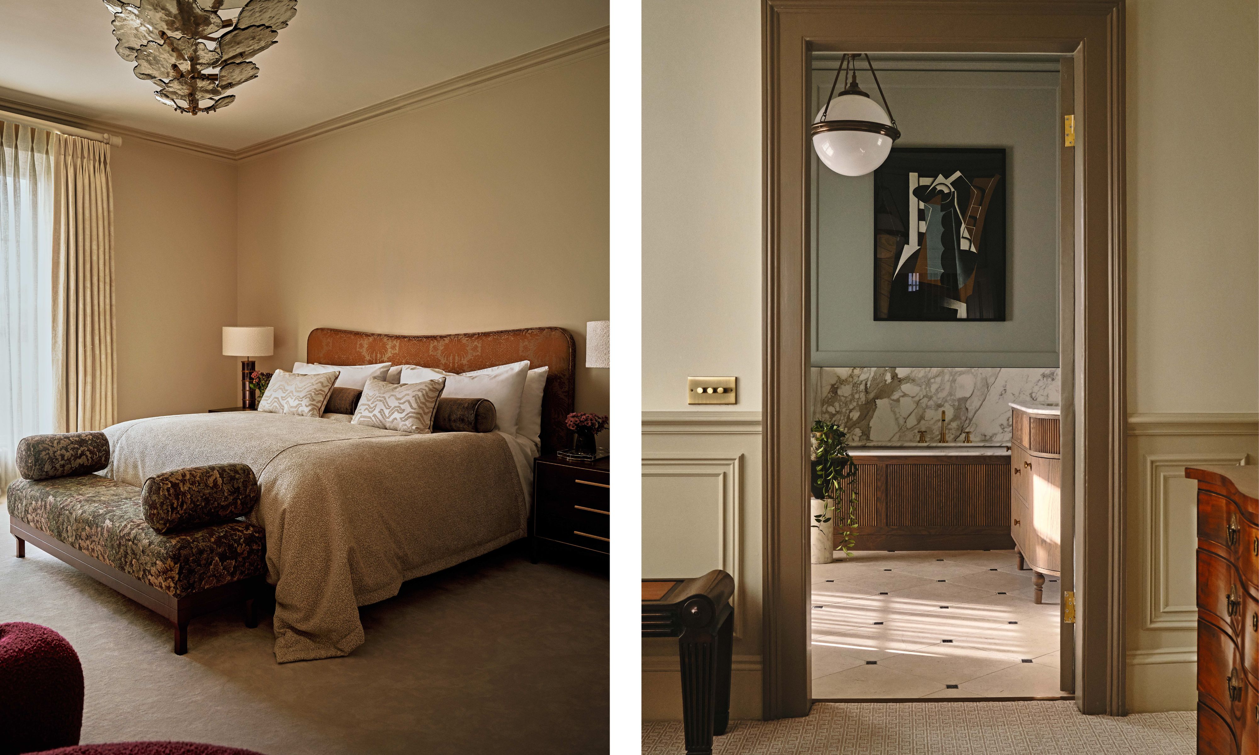 Left image: Warm, neutral-toned bedroom with a textured headboard and cozy bed dressed in beige linens. An upholstered bench with bolster pillows sits at the foot of the bed beneath a sculptural ceiling light. Right image: View through a doorway into a luxurious bathroom with marble wall accents, soft lighting, and a modern pendant light. The space includes a wooden vanity and bathtub with a piece of abstract art above the bathtub.