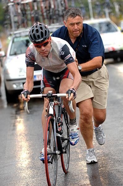 Cadel Evans (Predictor-Lotto) gets a push after some servicing.