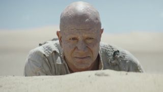 Temuera Morrison as helmetless Boba Fett in Tatooine desert