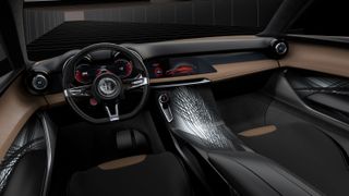 The strikingly futuristic interior dash and steering wheel of the Alfa Romeo Tonale Concept