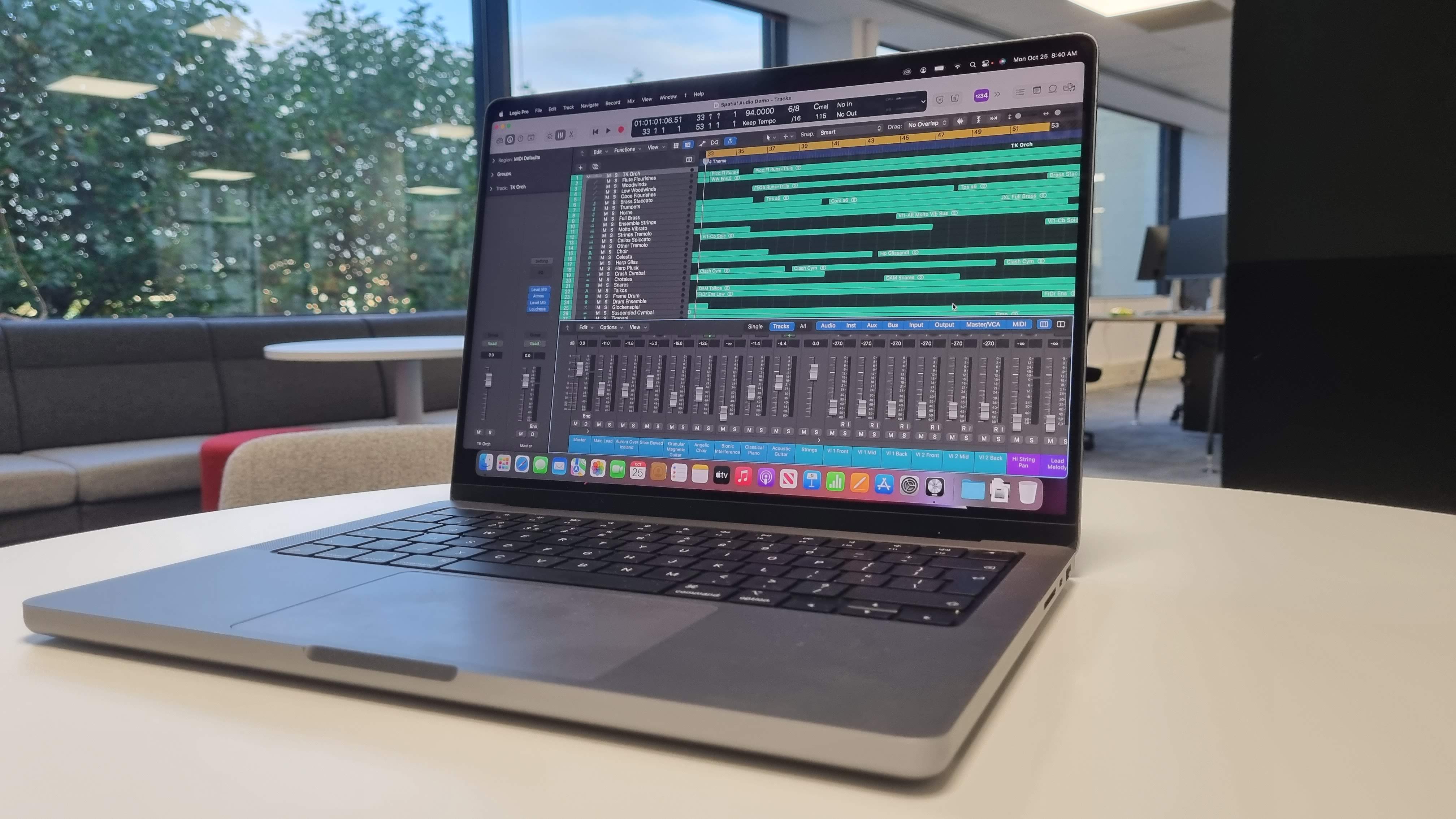 MacBook Pro 14-inch on a table in an office