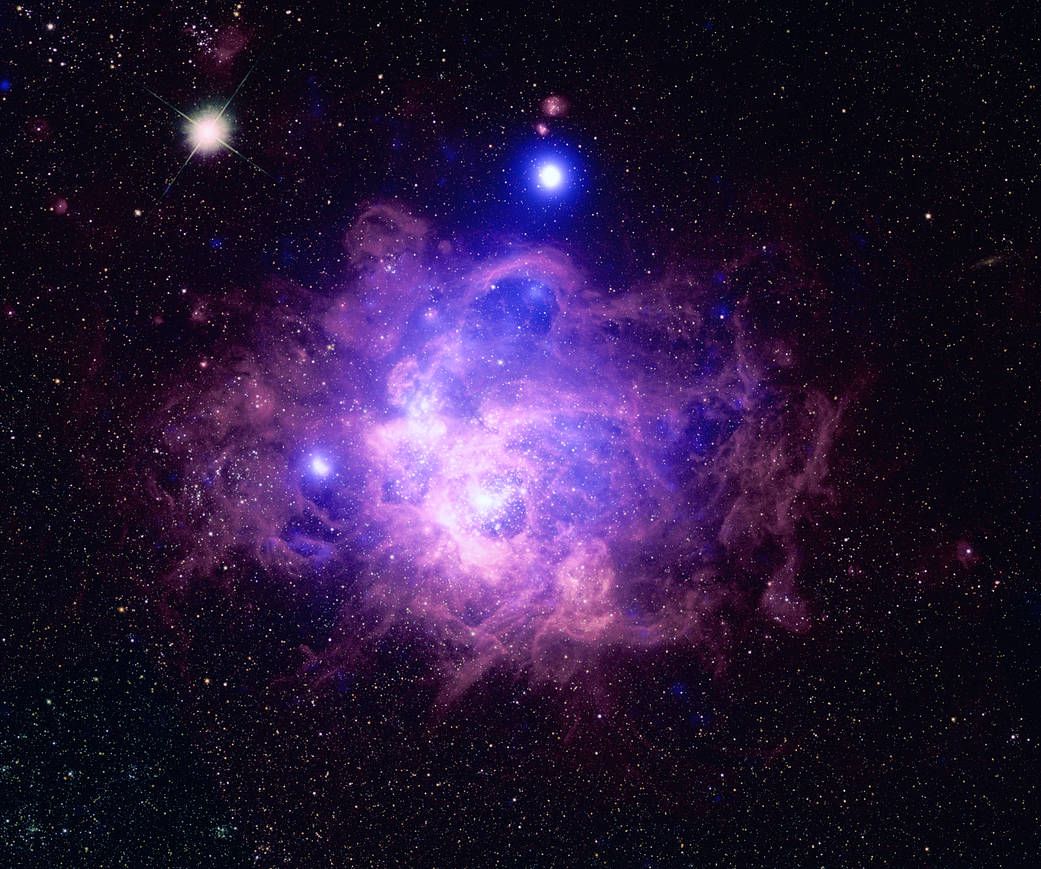 This image combines data from the Chandra X-Ray Observatory in blue and from the Hubble Space Telescope in purple of a star-forming region called NGC 604.