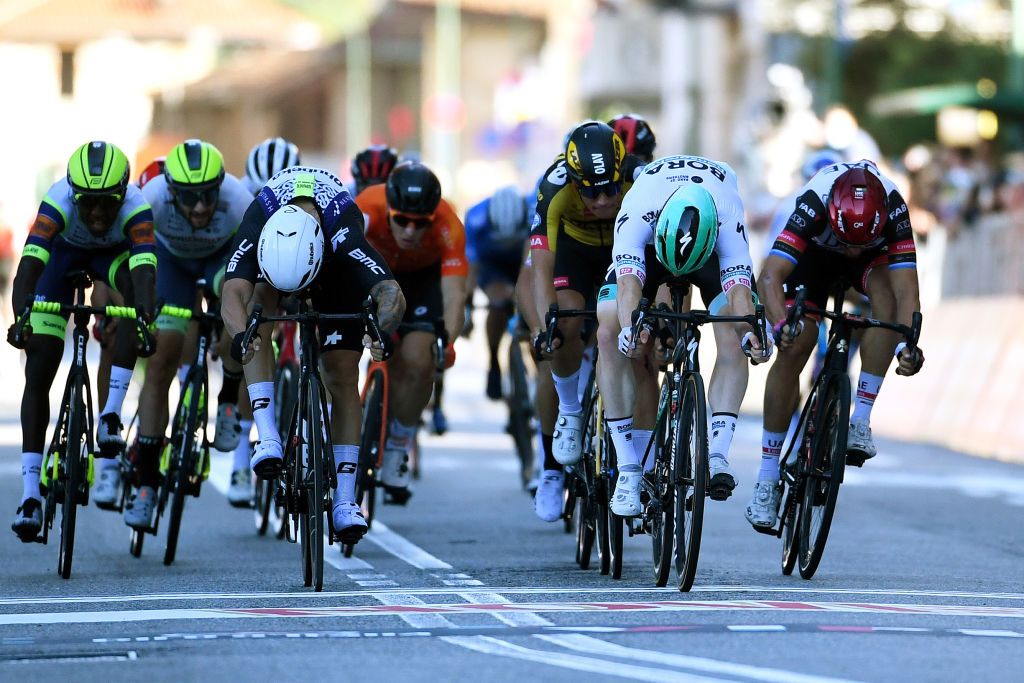 BORGOSESIA ITALY OCTOBER 07 LR Giacomo Nizzolo of Italy and Team Qhubeka Nexthash Olav Kooij of Netherlands and Team Jumbo Visma Matthew Walls of United Kingdom and Team Bora Hansgrohe and Matteo Trentin of Italy and UAE Team Emirates sprint at finish line during the 105th Gran Piemonte 2021 a 168km race from Rocca Canavese to Borgosesia 350m GranPiemonte on October 07 2021 in Borgosesia Italy Photo by Tim de WaeleGetty Images