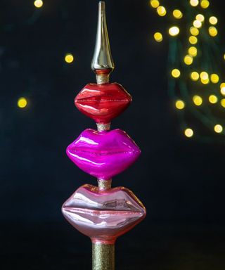 Trio of colored lips on Christmas tree topper