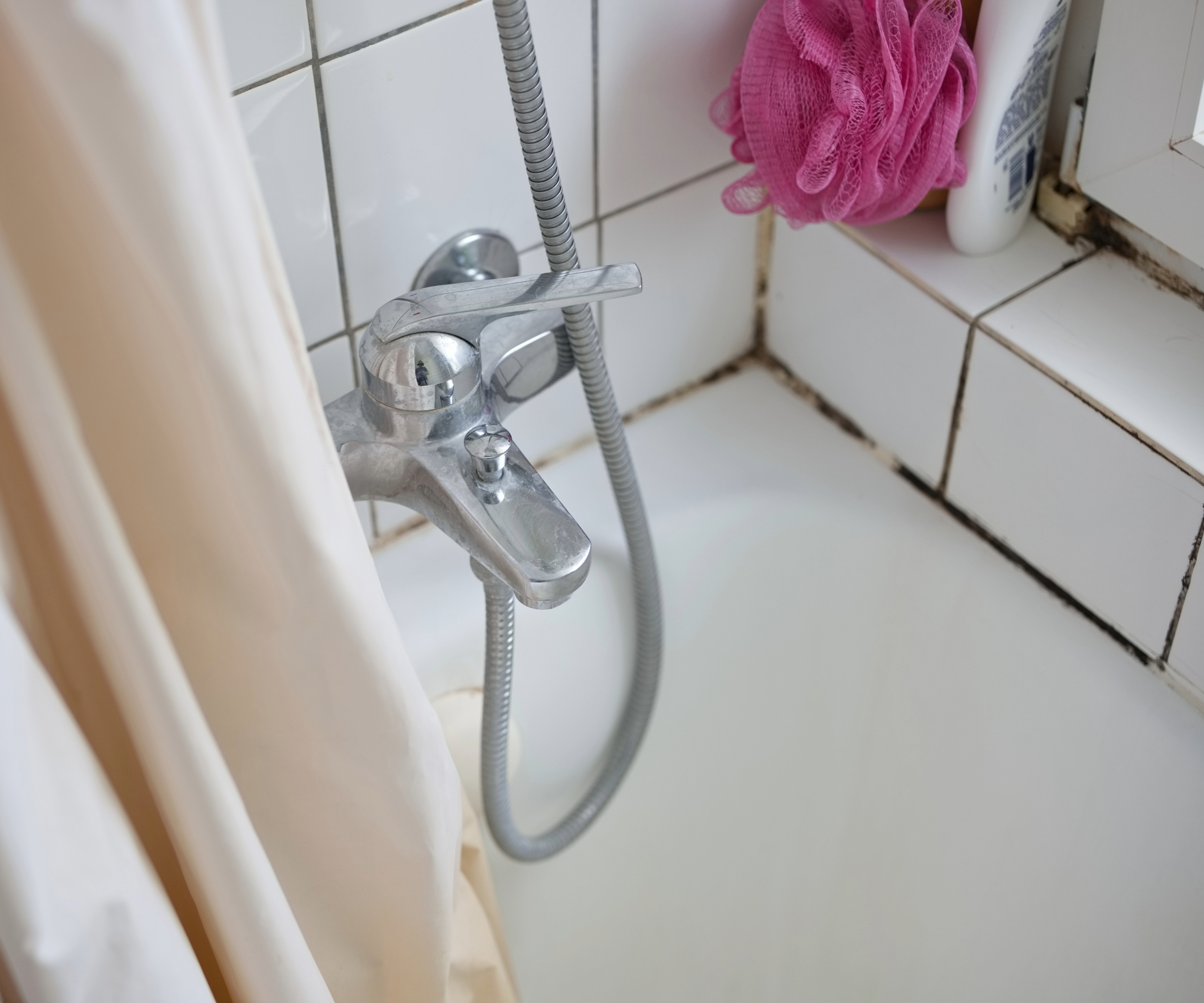 Mould on bathroom silicone around the bath