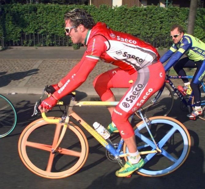 Only 'Cipo' could pull off riding a rainbow bike