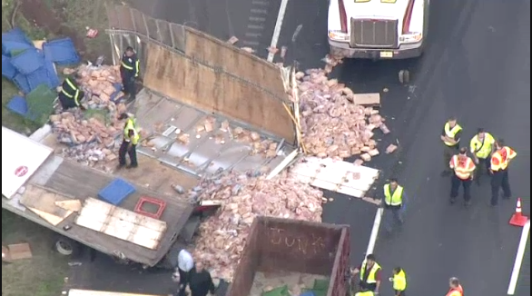 A truck carrying deli meat hit another truck carrying bread and created a sandwich-like mess on the New Jersey highway.