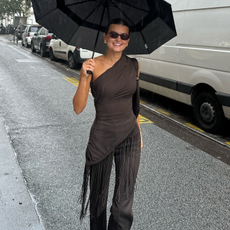 Fashion person Liv Madaline wears the best square boots. She pairs with a midaxi skirt, black jumper and shoulder bag. 