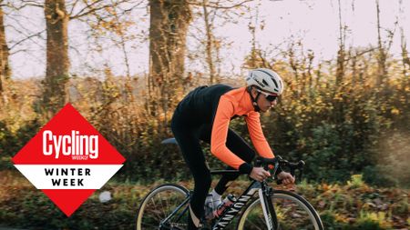 Male cyclist riding outside in the winter