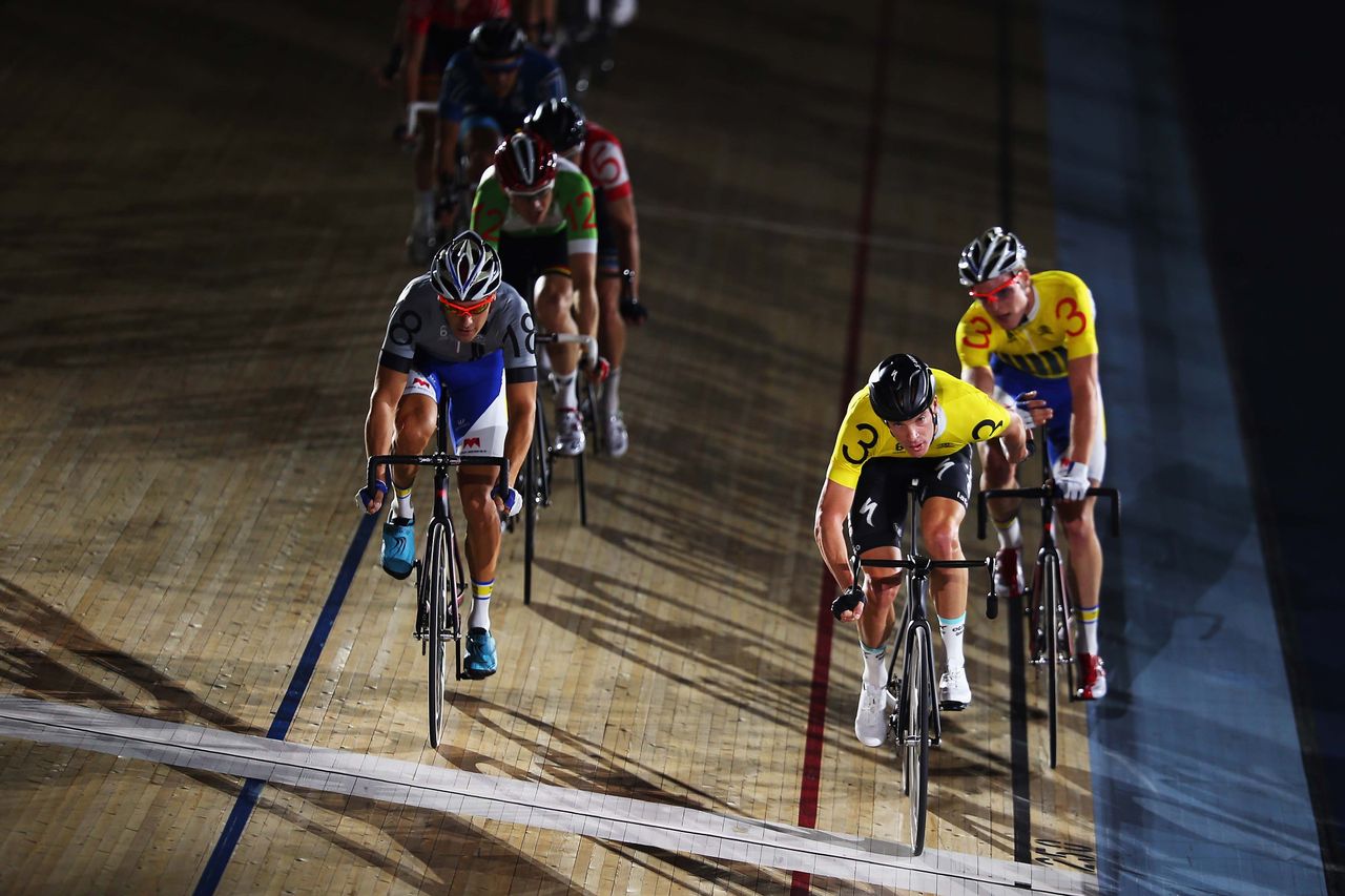 Iljo Keisse and Gijs van Hoecke (in yellow) make a change