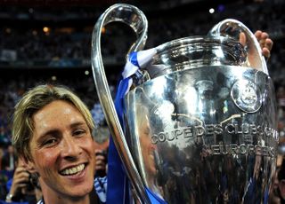Fernando Torres celebrates with the Champions League trophy after Chelsea's win over Bayern Munich in the 2012 final.