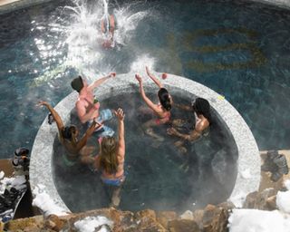 group of people having fun in a hot tub