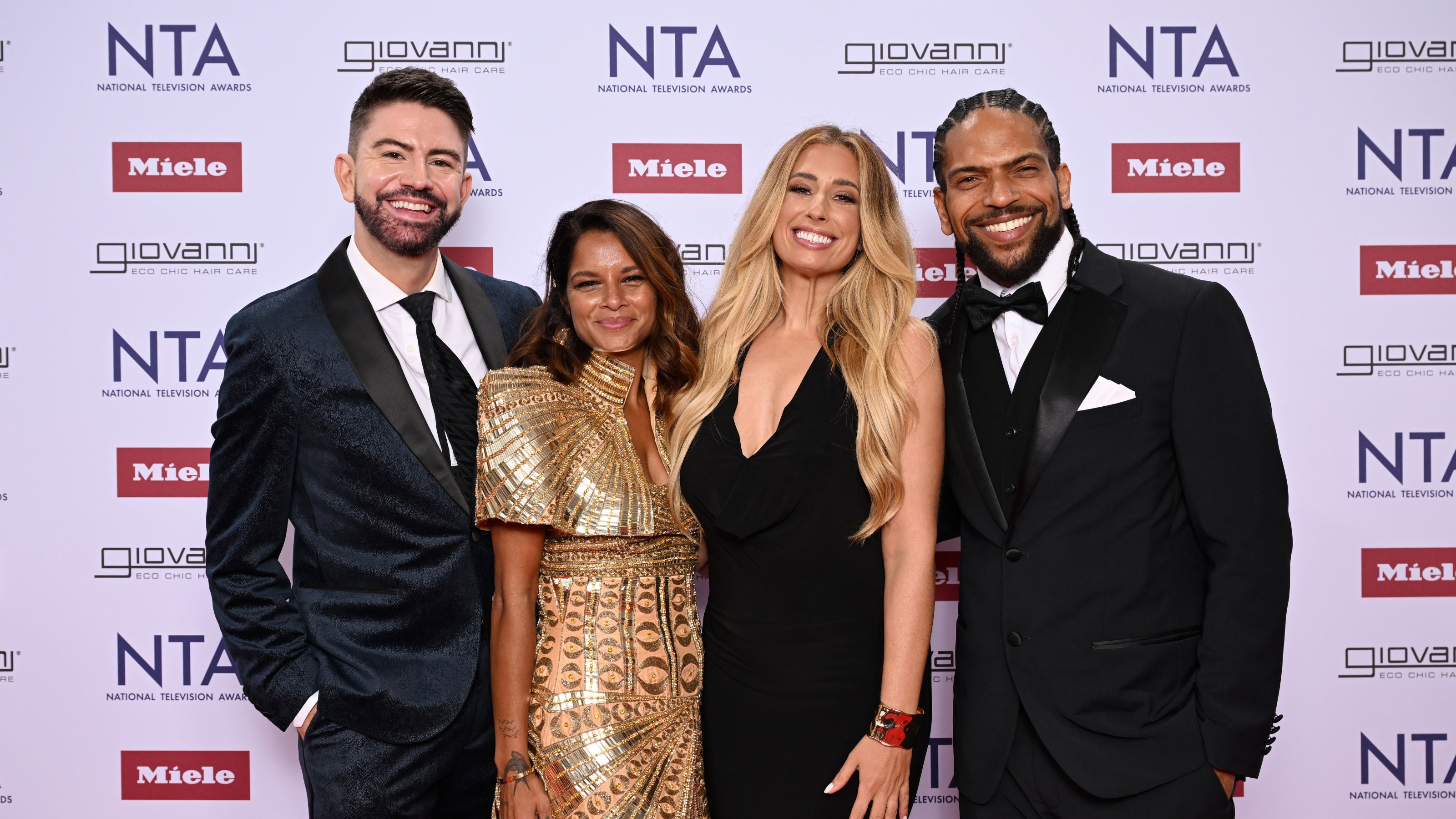 Iwan Carrington, Dilly Carter, Stacey Solomon and Robert Bent smiling on the red carpet
