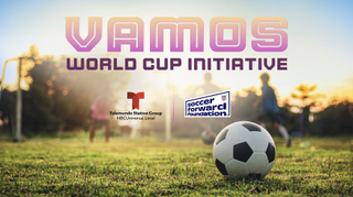 Shot of a soccer ball and field with the Vamos World Cup Initiative logo