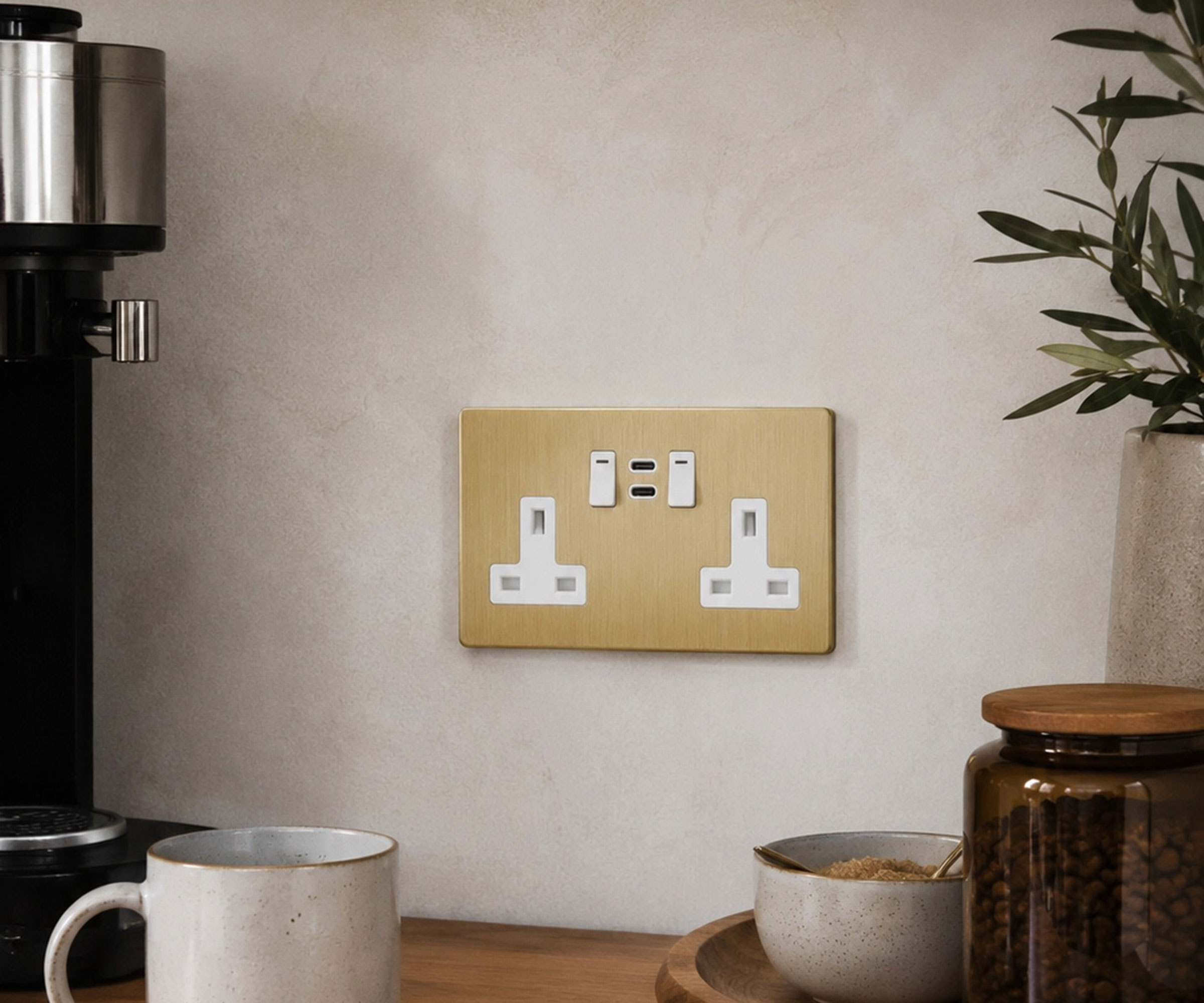 brushed brass USB socket in kitchen over worktop