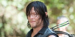 Daryl with his crossbow on his back
