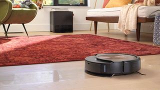 Roomba J9+ Combo robot vacuum and mop shown on floor