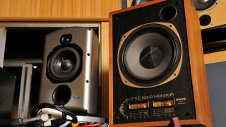 A pair of studio monitors in a recording studio