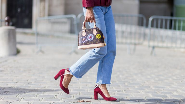 Woman in Jeans with red shoes