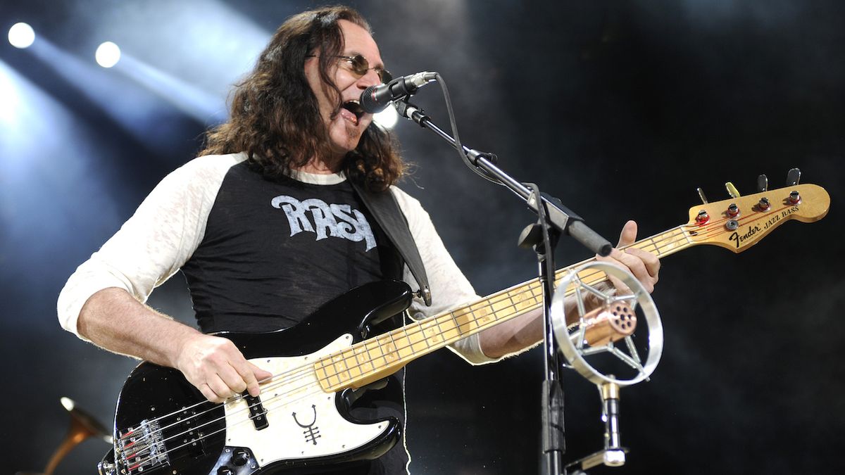 Geddy Lee of Rush performs part of the bands&#039; Time Machine Tour at Sleep Train Pavilion on June 26, 2011 in Concord, California.