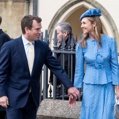 Harriet Sperling holding hands with Peter Phillips