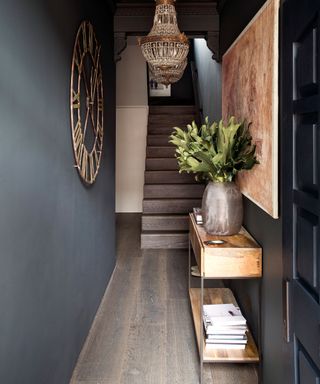 Hallway storage ideas with grey walls and slimline console