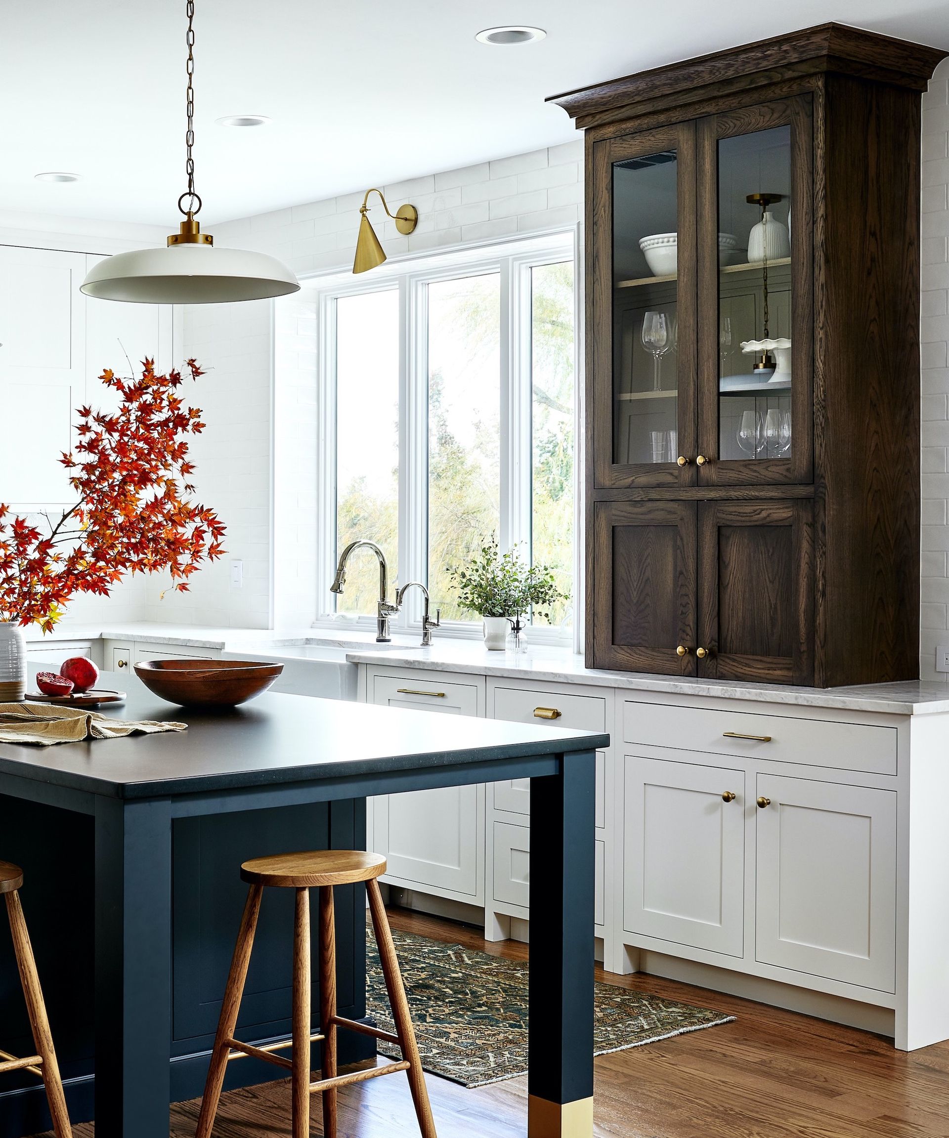 bespoke white and blue kitchen with wooden countertop cabinet
