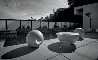 ‘Sphere’ sculpture; ‘Hemisphere’ table by May Furniture