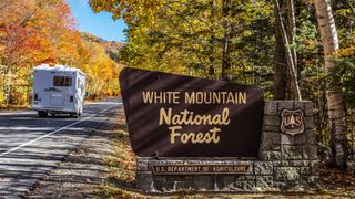The welcome to White Mountain National Forest sign in Lincoln, New Hampshire