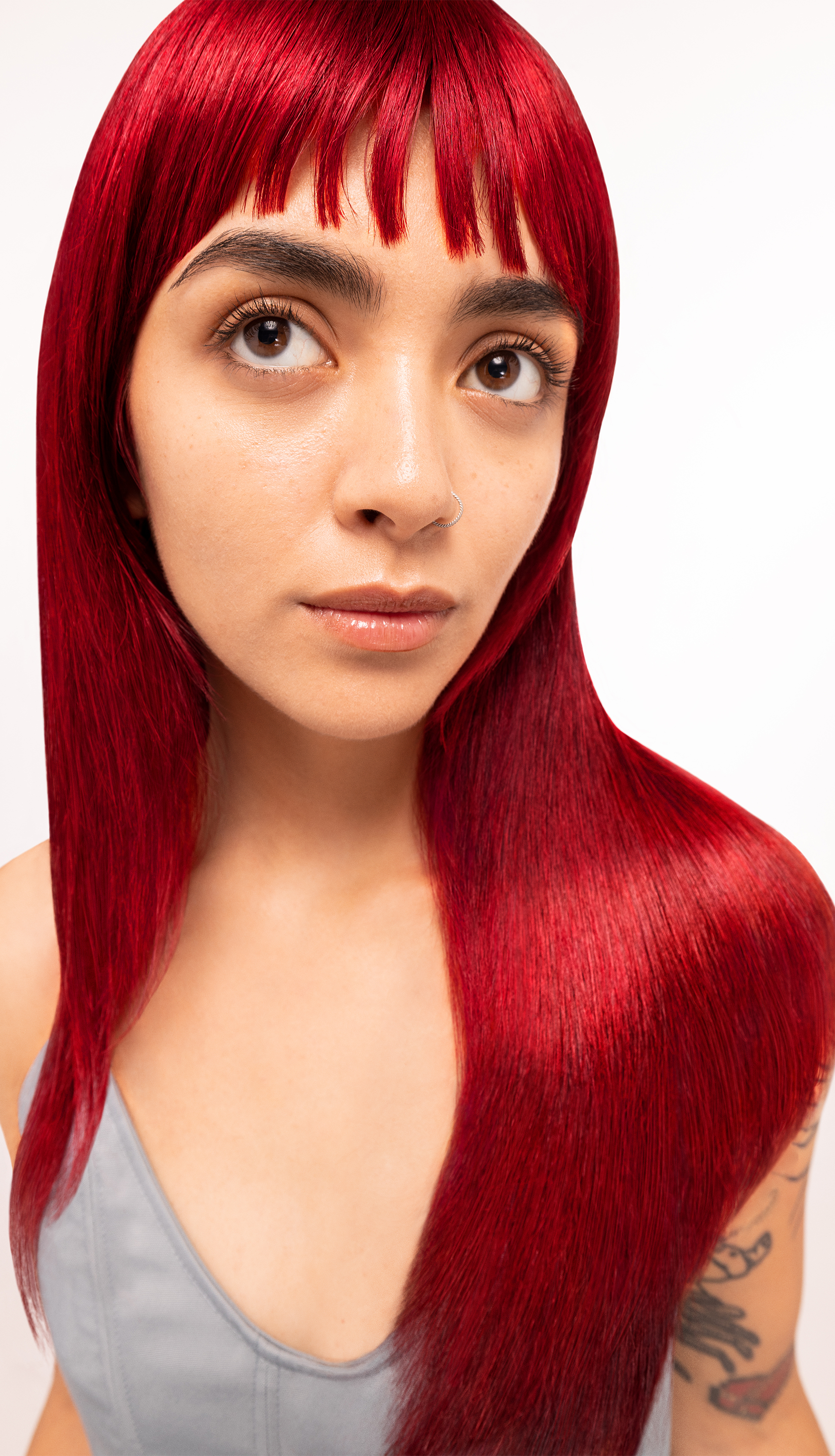 Model with red hair, achieved with Bleach London No Bleach Hair Dye