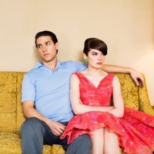 man and woman on a couch