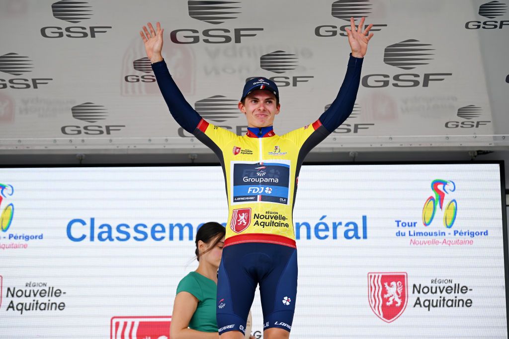BNVENTLABBAYE FRANCE AUGUST 15 Romain Grgoire of France and Team Groupama FDJ celebrates at podium as Yellow leader jersey winner during the 56th Tour du LimousinPerigord Nouvelle Aquitaine 2023 Stage 1 a 1657km stage from RilhacRancon to BeneventlAbbaye on August 15 2023 in BeneventlAbbaye France Photo by Dario BelingheriGetty Images