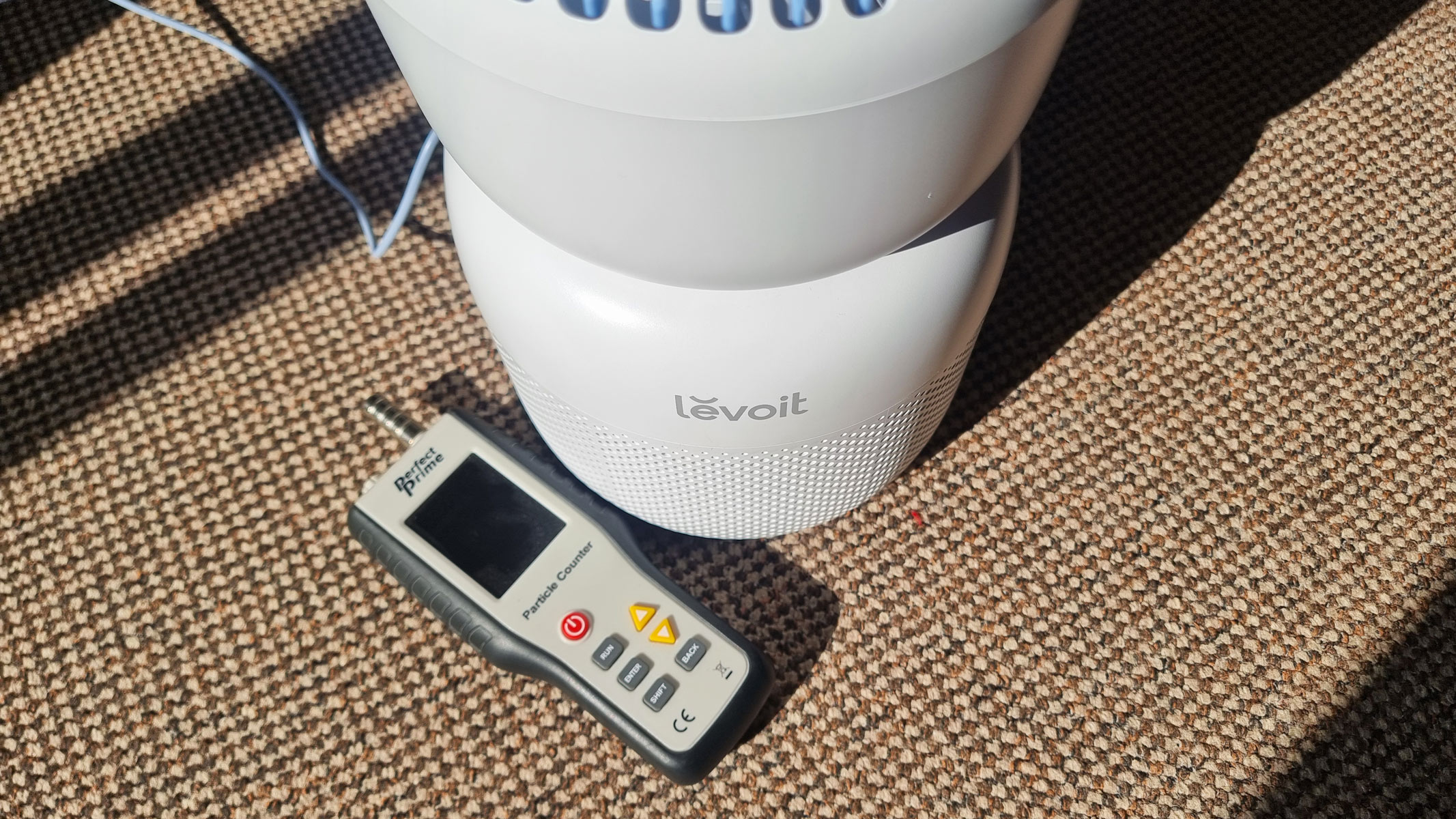 Levoit Sprout air purifier and Perfect Prime air particle monitor