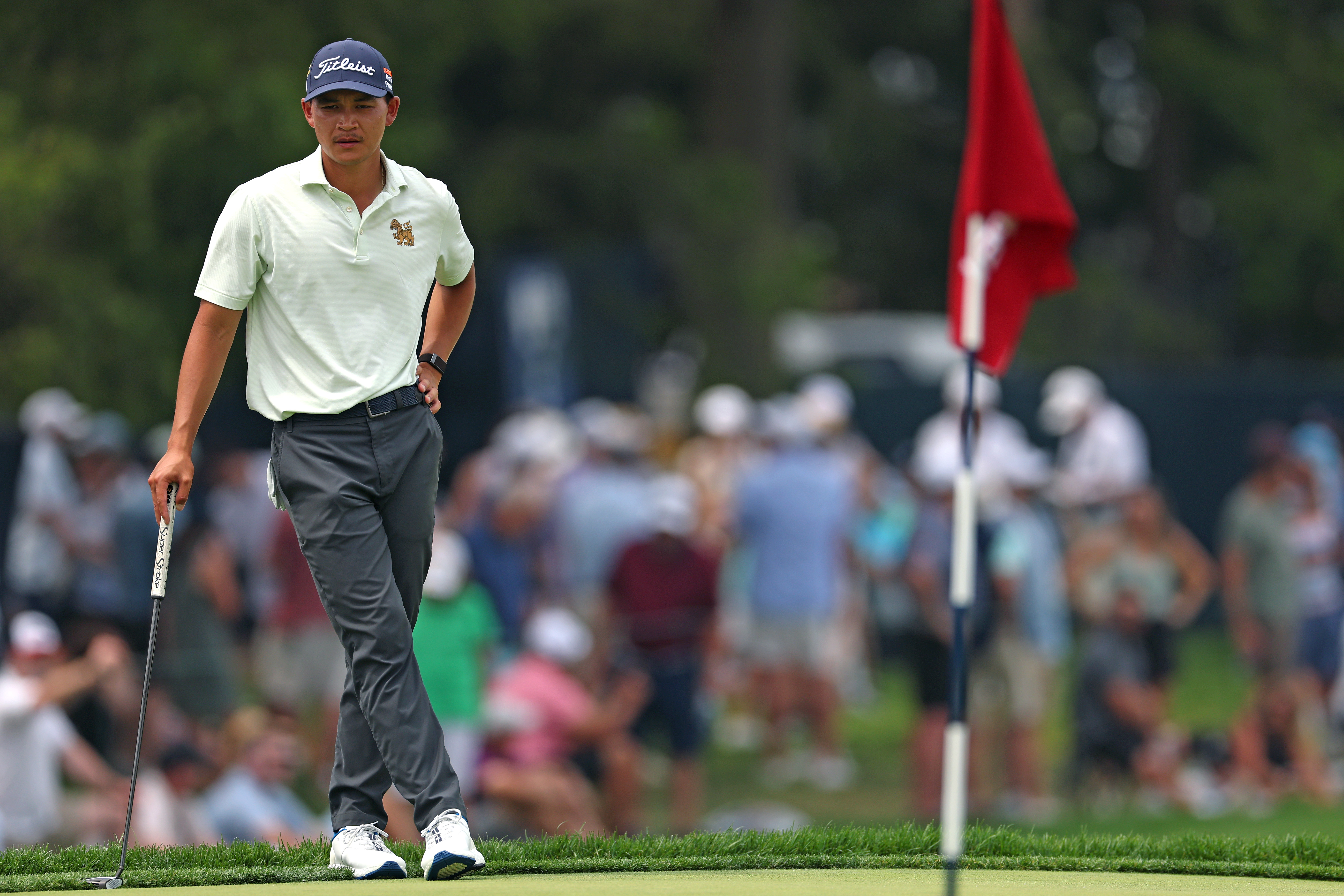 George Duangmanee watches over a putt