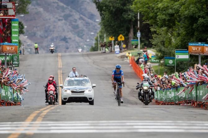 Lachlan Morton (Garmin-Sharp) rides into the finish with no one else in sight.