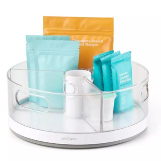 a clear lazy susan turntbale for storing items