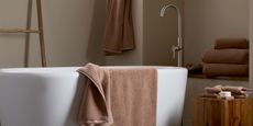 Parachute's Organic Plush Bath collection in clay featured in a modern bathroom