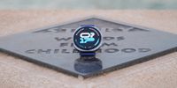 The Samsung Galaxy Watch 8 showing an athletic watch face on a plaque.